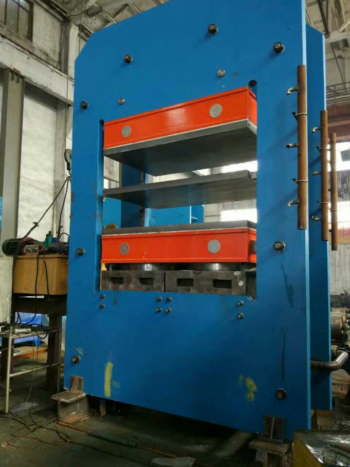 Frame plate vulcanizing press
